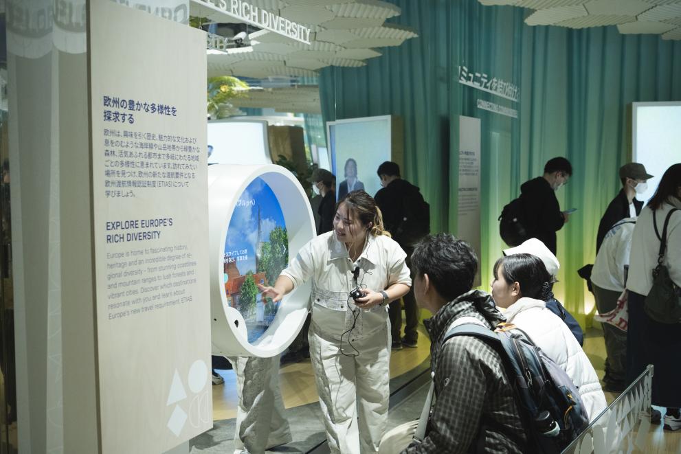 Visitors testing features of the EU Pavilion